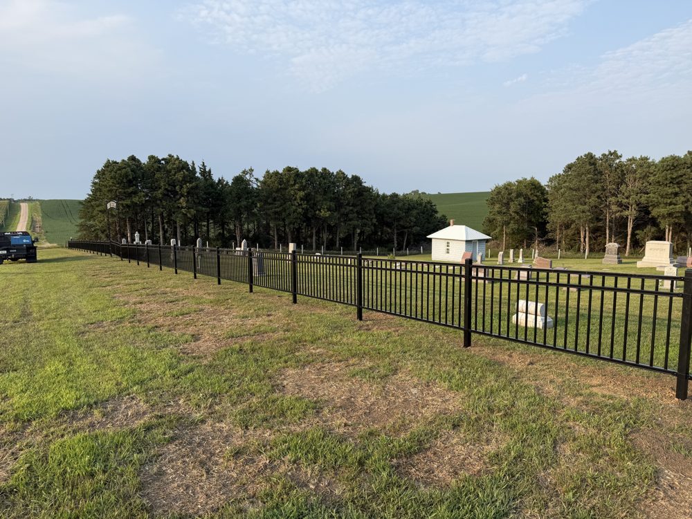 Wood privacy fence installed behind a home