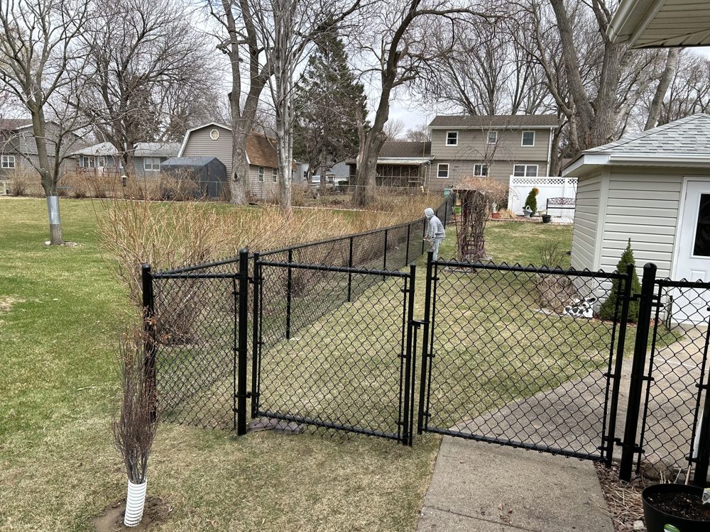 Chain link fence installed around a commercial lot