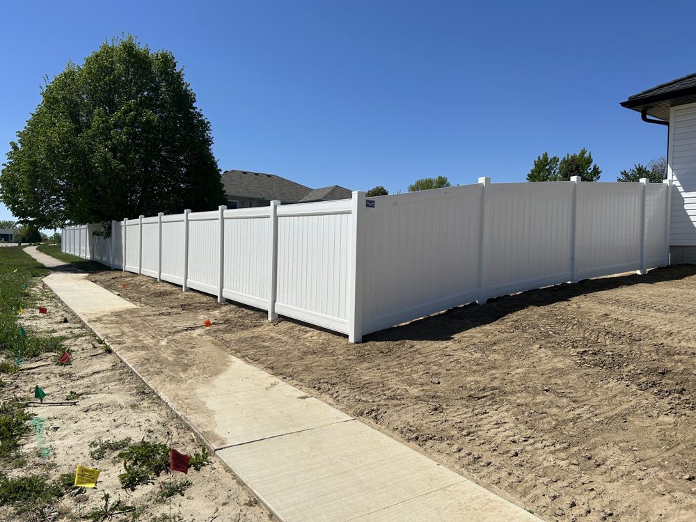 Ornamental steel fence installed along a front yard